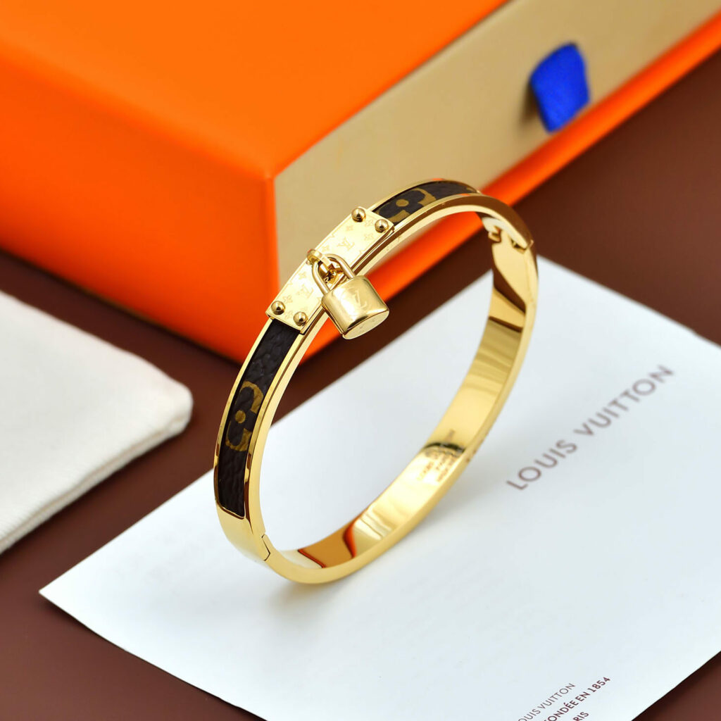 Bracelet jonc rigide avec cadenas et insert en toile Monogram
