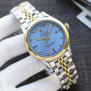 Montre bicolore avec cadran bleu glacier