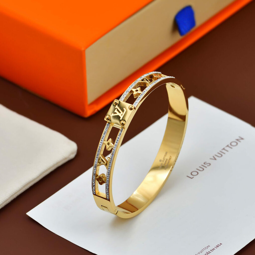Bracelet jonc ajouré Monogram avec strass et cadenas